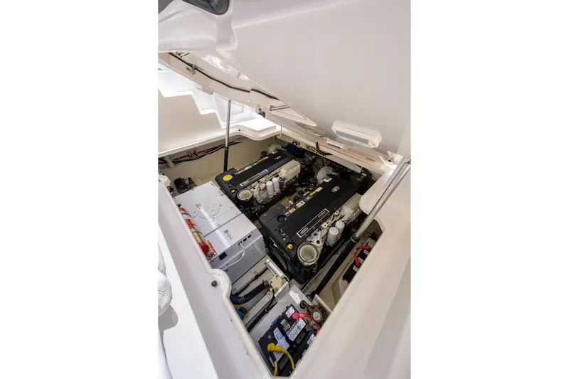  Yacht Photos Pics Engine compartment of 2013 Tiara Yachts 3900 Sovran, showcasing dual engines and components.