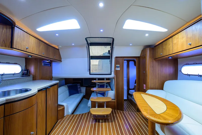  Yacht Photos Pics Luxurious interior of 2013 Tiara Yachts 3900 Sovran with elegant wood finishes and modern amenities.
