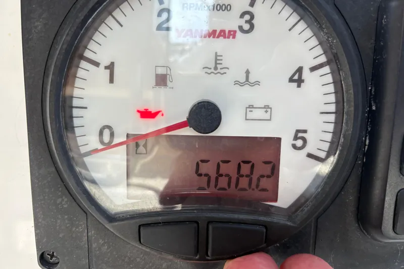 Alpha-joy Yacht Photos Pics Close-up of Jeanneau Sun Odyssey 349 tachometer displaying 568.2 hours, 2017 model.