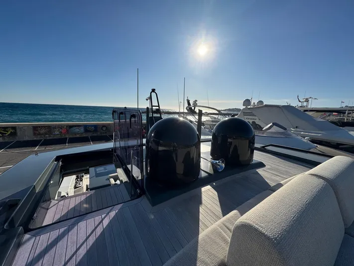 Yacht Photos Pics 2022 Bluegame BGX70 yacht deck with ocean view and bright sun.