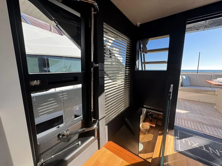  Yacht Photos Pics Interior view of 2022 Bluegame BGX70 yacht, featuring modern design and ocean view.