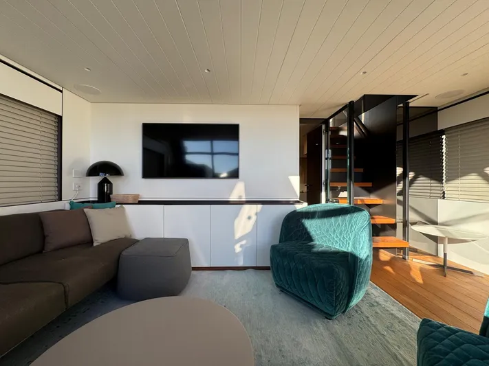  Yacht Photos Pics Luxurious interior of 2022 Bluegame BGX70 yacht with modern furnishings and elegant design.