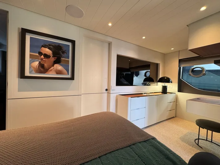  Yacht Photos Pics Luxurious interior of 2022 Bluegame BGX70 yacht with modern decor and elegant furnishings.