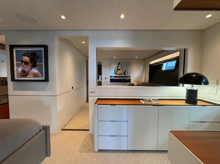  Yacht Photos Pics Luxurious interior of 2022 Bluegame BGX70 yacht with modern decor and elegant furnishings.