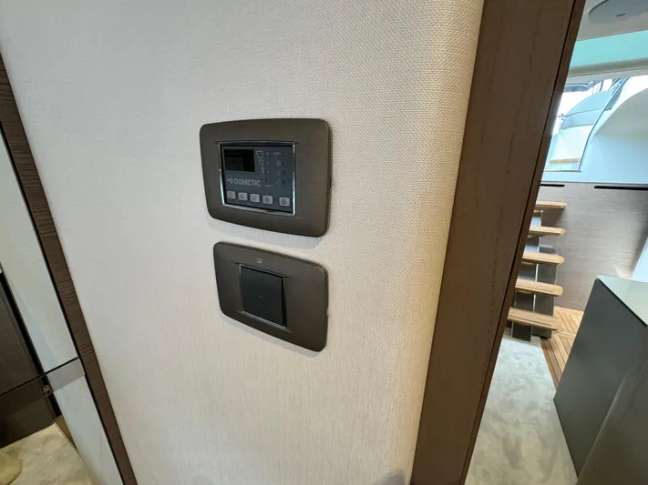  Yacht Photos Pics Control panel and switch inside 2023 Princess V50 Open yacht interior.