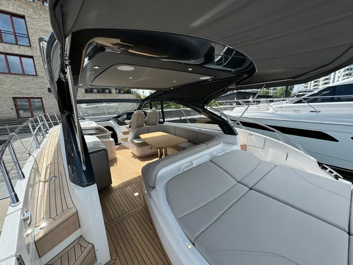  Yacht Photos Pics 2023 Princess V50 Open yacht with luxurious seating and sleek design.