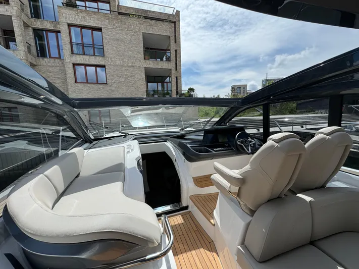  Yacht Photos Pics 2023 Princess V50 Open yacht interior with luxurious seating and modern design.