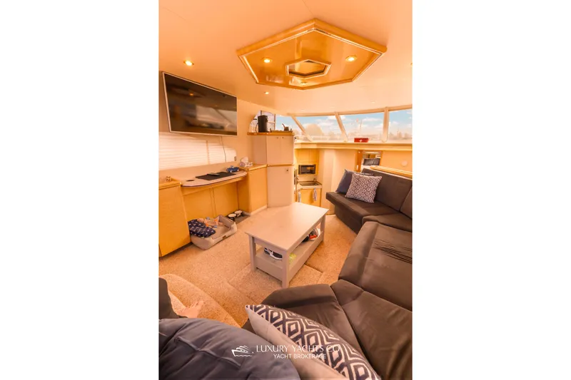  Yacht Photos Pics Luxurious interior of 1997 Neptunus 50 Aft Cabin yacht with modern furnishings.
