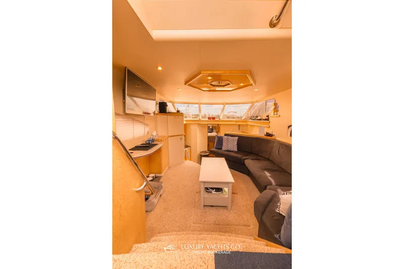  Yacht Photos Pics Luxurious interior of 1997 Neptunus 50 Aft Cabin yacht with modern furnishings.