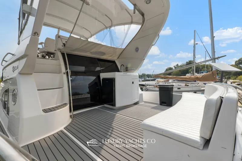  Yacht Photos Pics 1997 Neptunus 50 Aft Cabin yacht with spacious deck and seating area.