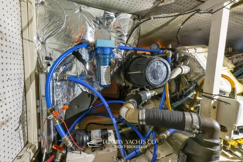  Yacht Photos Pics Engine room of 1997 Neptunus 50 Aft Cabin yacht with visible components and wiring.