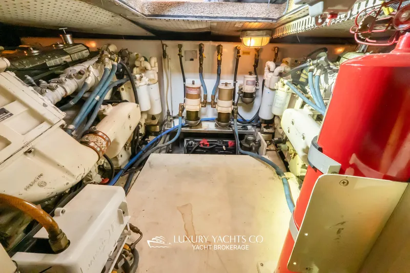  Yacht Photos Pics Engine room of 1997 Neptunus 50 Aft Cabin yacht, showcasing mechanical components.