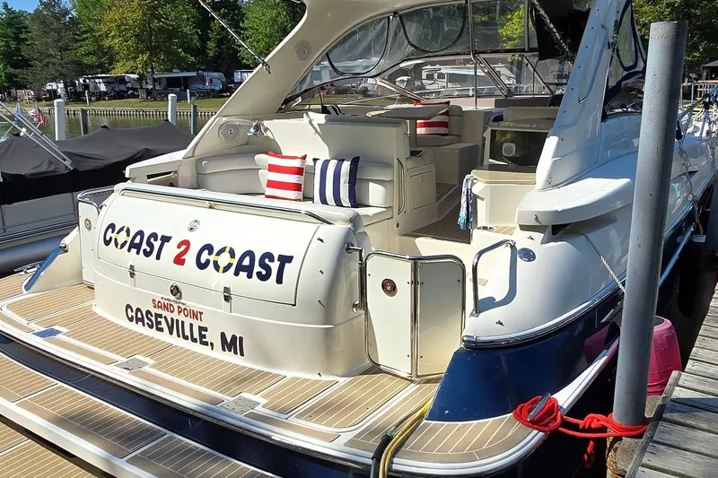  Yacht Photos Pics 2003 Regal Commodore 4260 yacht docked in Caseville, MI, with colorful cushions.
