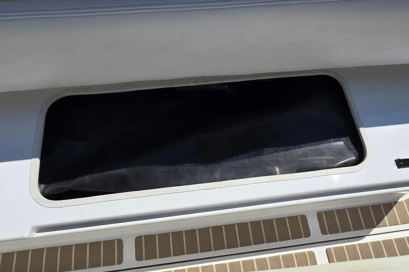  Yacht Photos Pics Storage compartment on a 2003 Regal Commodore 4260 boat deck.