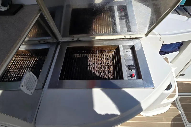  Yacht Photos Pics Outdoor grill on 2003 Regal Commodore 4260 yacht, featuring stainless steel design.