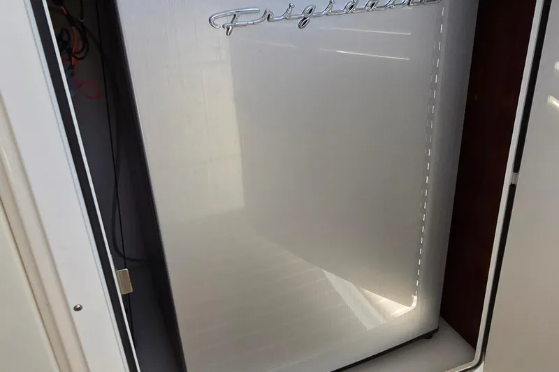  Yacht Photos Pics Frigidaire refrigerator door inside a 2003 Regal Commodore 4260 yacht.