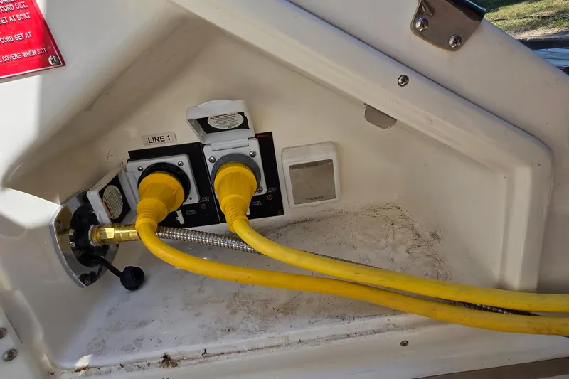  Yacht Photos Pics Electrical connections on a 2003 Regal Commodore 4260 boat, featuring yellow power cables.