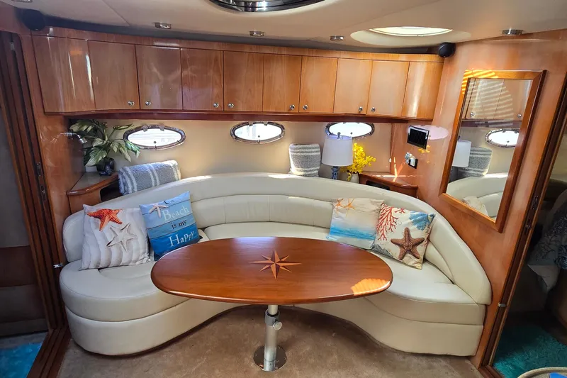  Yacht Photos Pics Luxurious 2003 Regal Commodore 4260 yacht interior with elegant seating and nautical decor.