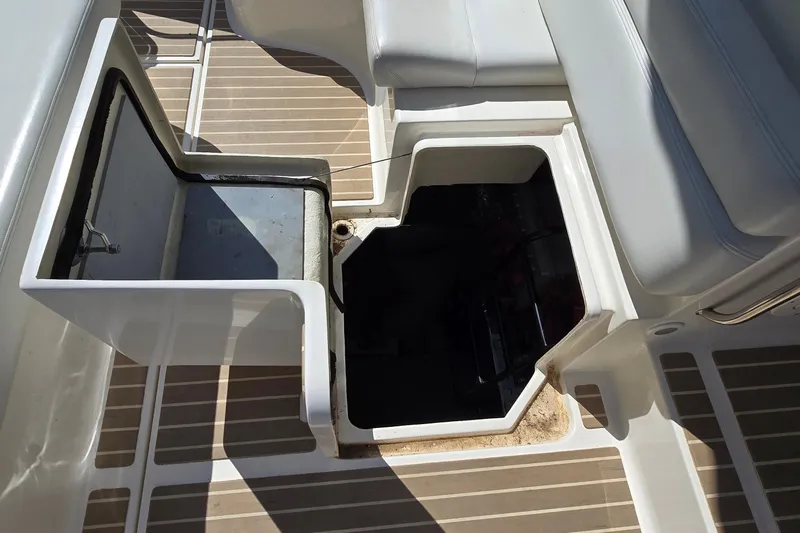  Yacht Photos Pics Open storage compartment on 2003 Regal Commodore 4260 boat deck.