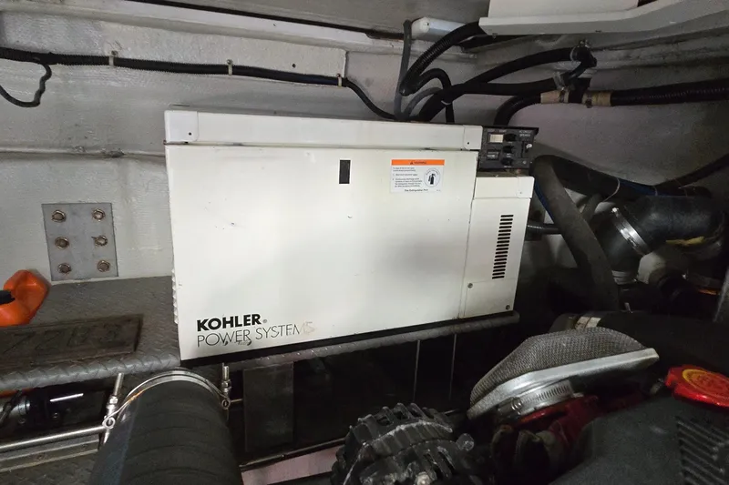  Yacht Photos Pics Engine room of 2003 Regal Commodore 4260 with Kohler power system generator.