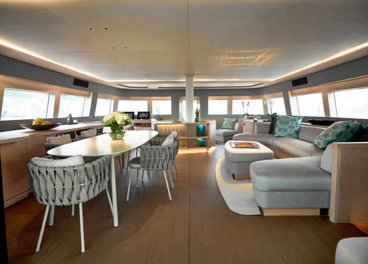 Kajikia Yacht Photos Pics Luxurious interior of 2023 Lagoon 77 yacht with modern furnishings and elegant design.