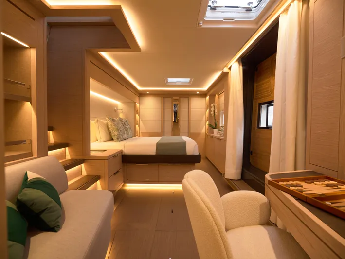 Kajikia Yacht Photos Pics Luxurious interior of 2023 Lagoon 77 yacht with modern furnishings and ambient lighting.