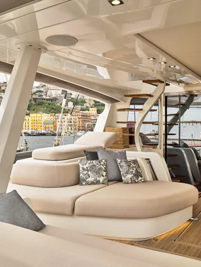 Kajikia Yacht Photos Pics Luxurious interior of 2023 Lagoon 77 yacht with elegant seating and scenic view.