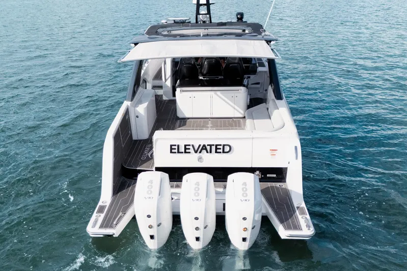  Yacht Photos Pics Azimut Verve 42 yacht, 2025 model, with triple outboard engines on open water.