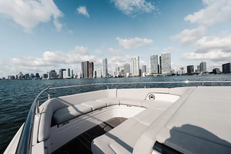  Yacht Photos Pics Azimut Verve 42 yacht cruising with city skyline in the background, 2025 model.