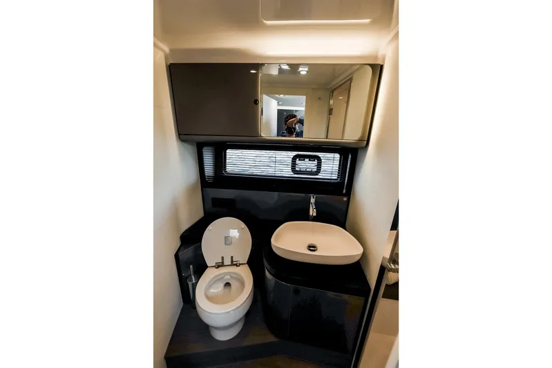  Yacht Photos Pics Modern bathroom interior of 2025 Azimut Verve 42 yacht with sleek fixtures.