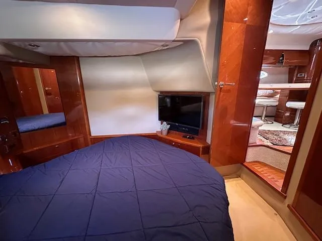 Everything 4 Sail Yacht Photos Pics Luxurious cabin interior of 2006 Princess 58v yacht with modern amenities.