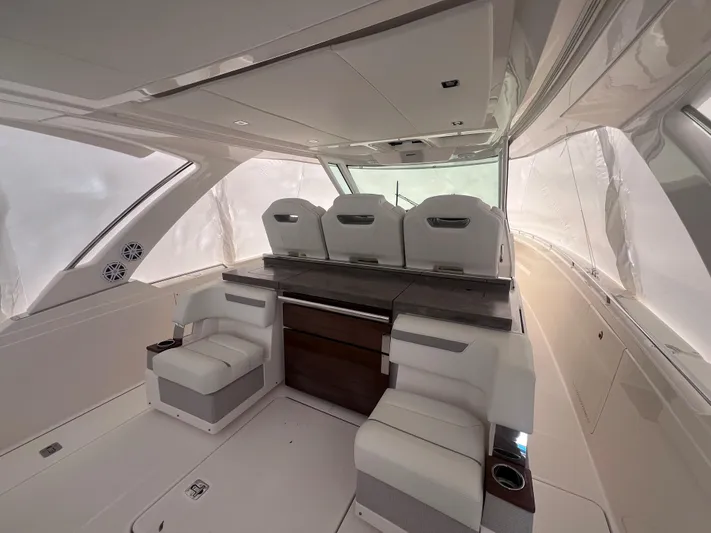  Yacht Photos Pics 2023 Tiara Yachts 38 LS interior with luxurious seating and modern design.