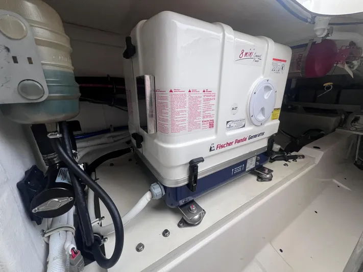  Yacht Photos Pics Engine room of 2023 Tiara Yachts 38 LS with Fischer Panda generator.