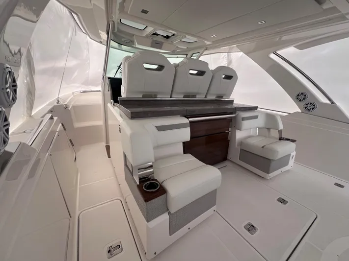  Yacht Photos Pics 2023 Tiara Yachts 38 LS interior with luxurious seating and modern design.