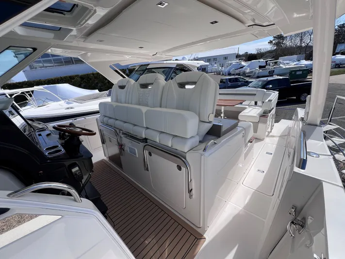  Yacht Photos Pics 2023 Tiara Yachts 38 LS interior with luxurious seating and modern design.