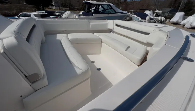  Yacht Photos Pics 2023 Tiara Yachts 38 LS boat interior with white seating and sleek design.