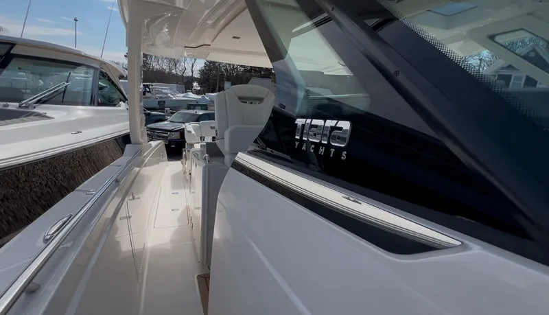  Yacht Photos Pics 2023 Tiara Yachts 38 LS, sleek design, luxury boat interior, side view.