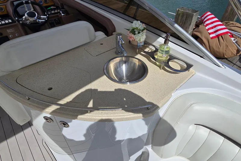  Yacht Photos Pics Luxury boat interior with sink and countertop on a 2011 Cobalt 323.