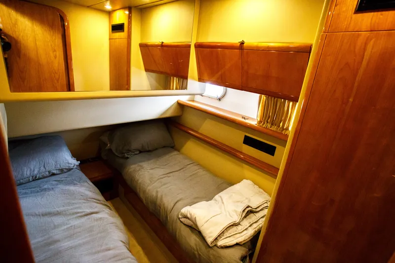 Arion Yacht Photos Pics 2003 Ferretti Yachts 530 twin bed cabin interior with wooden finishes.