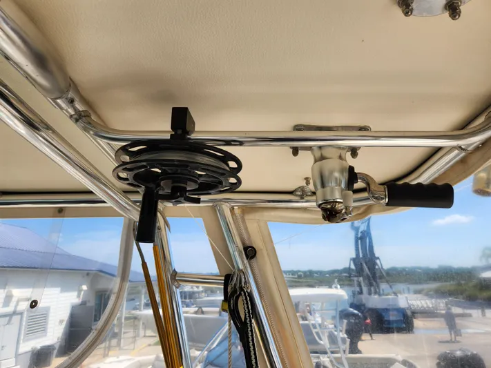 N' Pursuit Yacht Photos Pics Fishing rod holder on 2005 Pursuit 3070 Offshore Center Console boat interior.