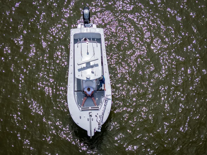  Yacht Photos Pics Aerial view of a 2017 Custom Carolina Style boat on water.