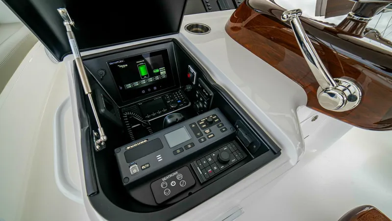 Free Spool Yacht Photos Pics Control panel of 2023 Viking 72 yacht, featuring advanced navigation and communication systems.