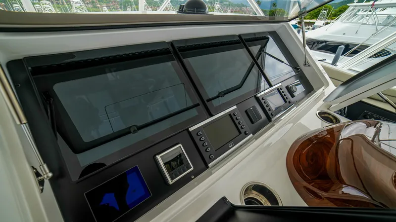 Free Spool Yacht Photos Pics 2023 Viking 72 yacht dashboard with advanced navigation controls and sleek design.