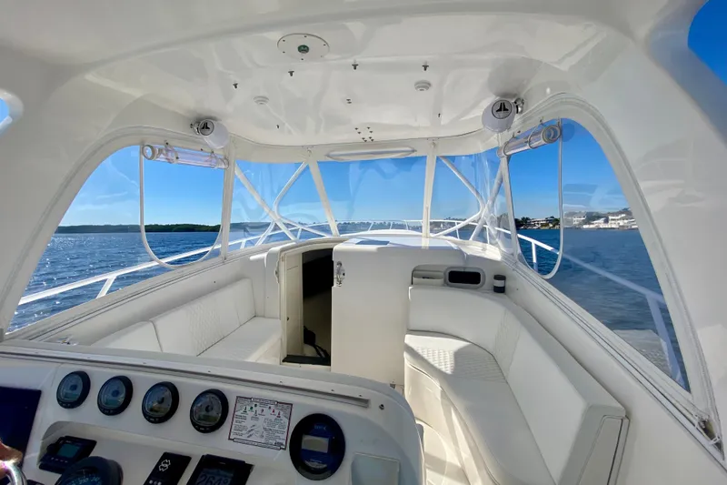  Yacht Photos Pics 2000 Intrepid 377 Walkaround boat interior with ocean view and clear blue sky.