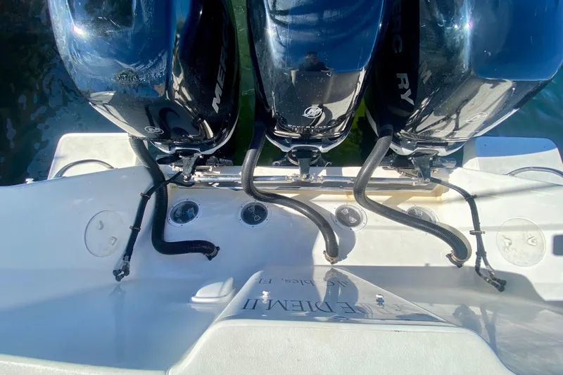  Yacht Photos Pics 2000 Intrepid 377 Walkaround with triple Mercury outboard engines, viewed from above.