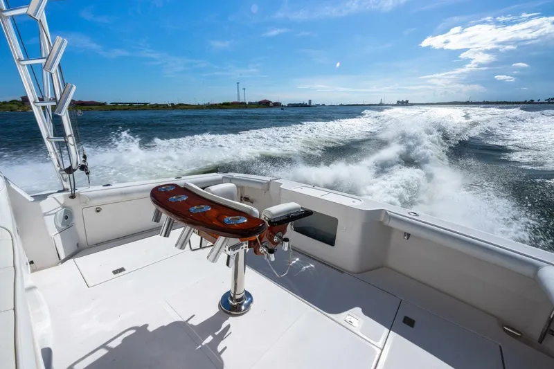 True Story Yacht Photos Pics 2012 Cabo 40 Hardtop Express cruising on open water, leaving a wake behind.