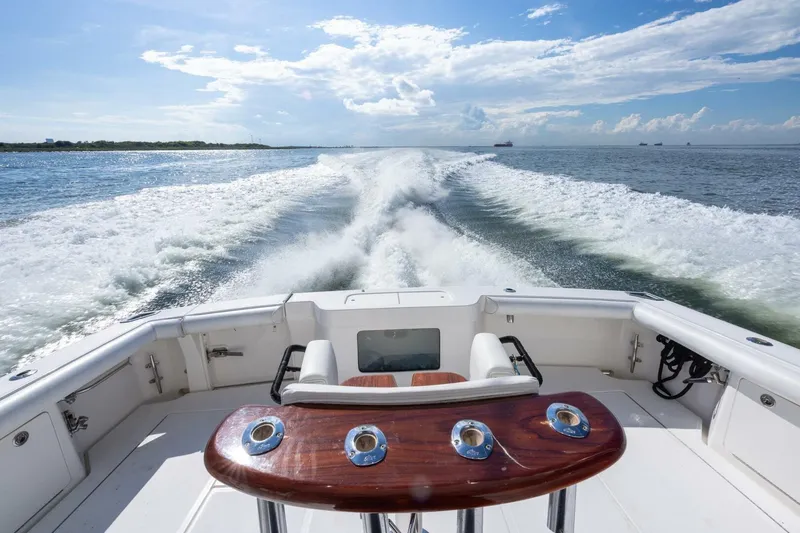 True Story Yacht Photos Pics 2012 Cabo 40 Hardtop Express cruising on open water, leaving a wake behind.