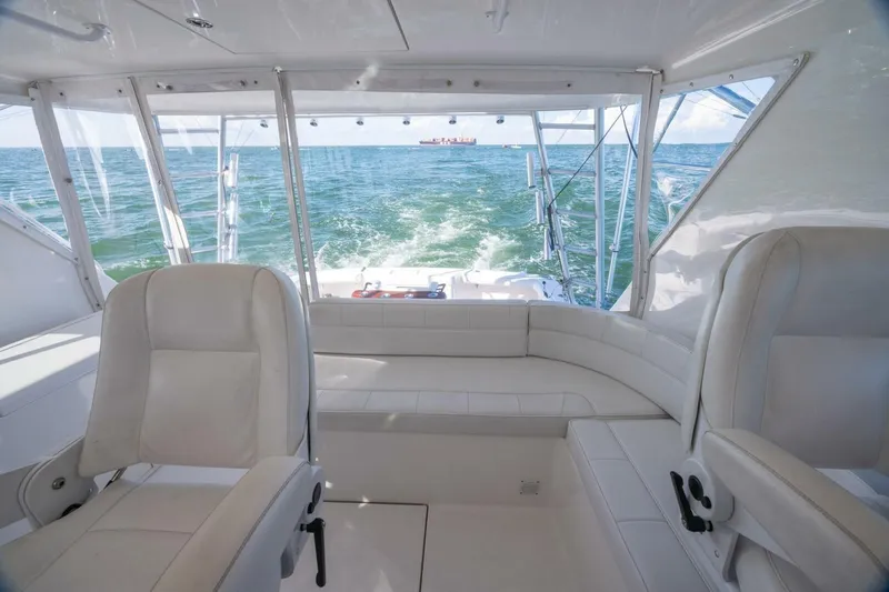 True Story Yacht Photos Pics Interior view of 2012 Cabo 40 Hardtop Express yacht with ocean backdrop.