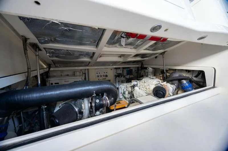 True Story Yacht Photos Pics Engine room of 2012 Cabo 40 Hardtop Express, showcasing mechanical components and systems.