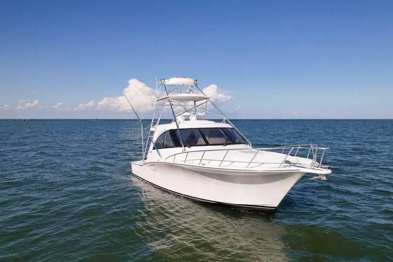 True Story Yacht Photos Pics 2012 Cabo 40 Hardtop Express yacht cruising on open water under clear skies.